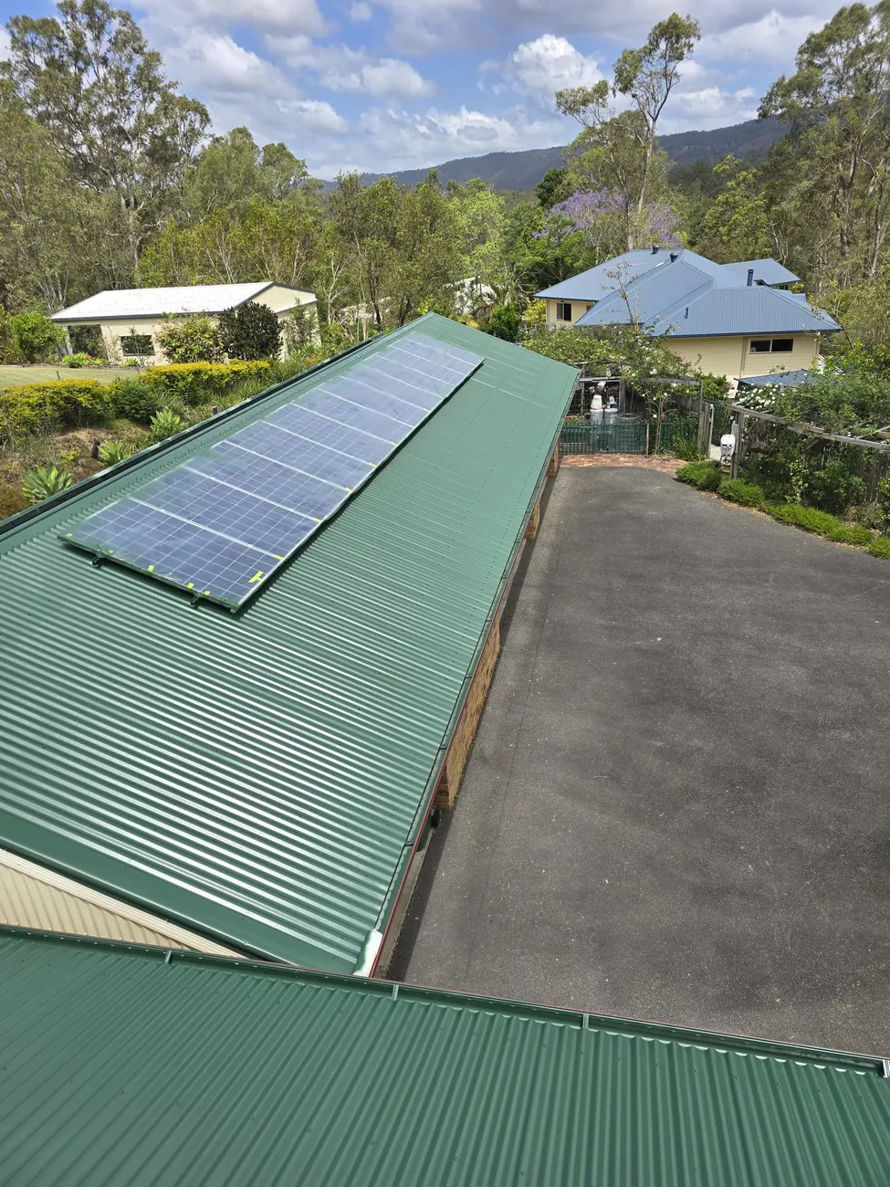 Colorbond roof restoration with driveway